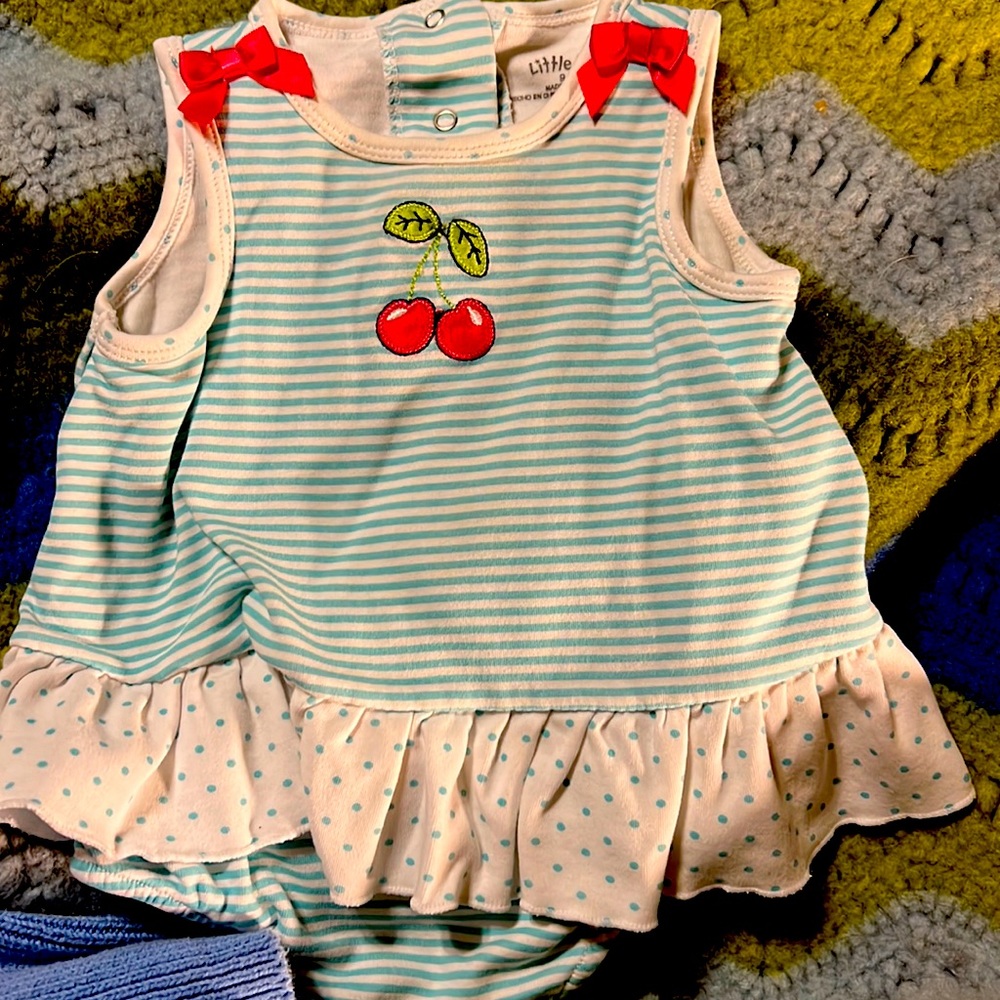 Slightly used girls 0-9 moths cherry dress pull up. Little me
